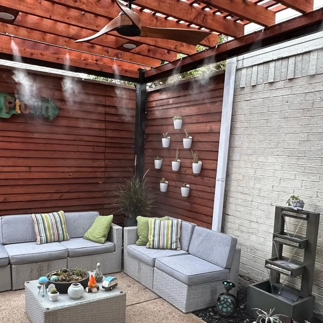 <p>The best place to install a misting line is on an <b>overhead structure like a patio roof or arbor.</b></p>
<p>Install the misting line between <b>8ft and 14ft</b> (ideal is <b>10–12ft</b>). If installing below 9ft, we recommend downsizing nozzle size by one.</p>
<p>Place nozzles <b>2ft apart</b> and angle them to fill the space with mist. Placing nozzles outside, or pointing them away from the space will reduce the cooling effect.</p>
<p>Misting lines can be placed along both open and closed sides, but as a general guideline, use open sides first.</p>
<p>If 4 sides are not sufficient to install the recommended number of nozzles, additional inner lines can be installed providing that each inner line is at least at these distances from the next parallel line:</p>
<ul>
<li>6ft apart for fully open spaces</li>
<li>12ft apart for patios with a roof and 4 open sides</li>
<li>14ft apart for patios with roof and 1+ closed side</li>
</ul>
<p>When hard overhead construction is not available, <b>string cable lights or steel cables </b>can be used to hold the misting lines.</p>
<p>When using string cable lights or steel cables, we recommend using only plastic tubing and zip ties to secure tubing to cables.</p>
<p>If no overhead options are available, you can also <b>attach misting nozzles to outdoor fans</b> for spot cooling.</p>
's 2. image